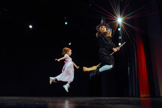 Actresses in Kids Play Performing on Stage in a Theatre. Charismatic duo performing together in school play 
