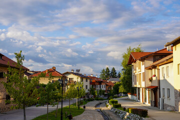 Obraz premium Pirin Street at Golden Hour, Bansko, Bulgaria