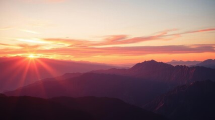 Obraz premium Sunset casting a warm glow over the breathtaking mountain range, with vibrant hues of orange, pink, and purple painting the sky, silhouette, mountain peaks