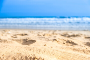 Nature of the beach and sea Summer with sunshine, sandy beaches, clear blue waters sparkling against the blue sky. On an island with good ecology and environment Background for summer vacation