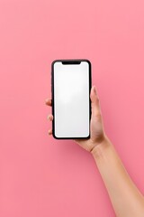 hand holding phone with white screen isolated on pink background mockup