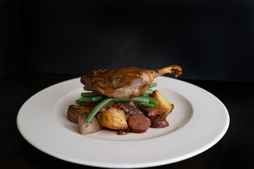 Confit of Duck on Roasted Vegetables