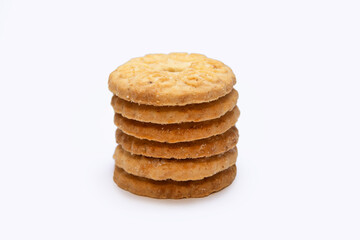 a stack of biscuits with a hole in the center on a white background