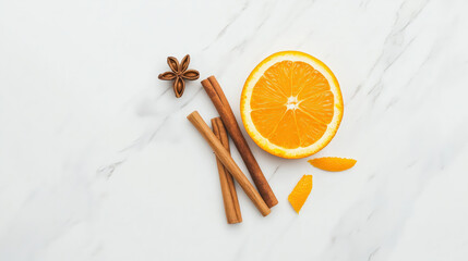 A vibrant arrangement of orange slices, cinnamon sticks, and star anise, set against a light...