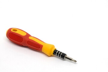 A close-up image of a red and yellow screwdriver with a comfortable rubber grip, designed for easy handling and precision work.