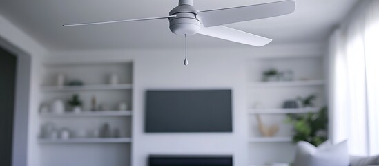 Bright white ceiling fan spinning in a minimalist living room, modern design 