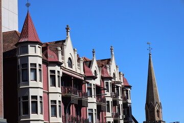 historic building and church spire against cloudless deep blue skies (sky)