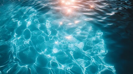 Sun Glints on Rippling Blue Water Surface