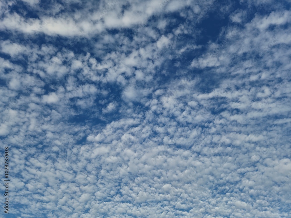 Wall mural blue sky with clouds