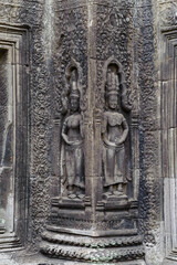 Bas-relief Sculpture at Ta Prohm temple, Siem Reap, Cambodia.