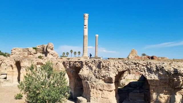 Ruins and columns of the Roman settlement of Carthage in Tunis, Tunesia on a sunny spring day with blue sky