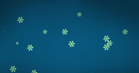 Digital image of snowflakes icons falling against copy space on blue background