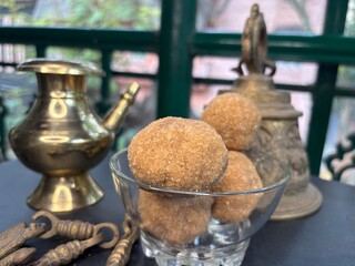 Exclusive shots of rare kerala traditional desert known as ari unda or rice laddu