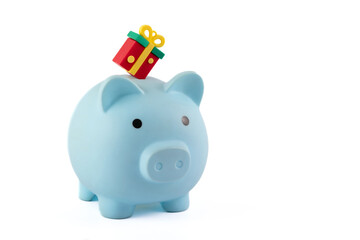 Blue piggy bank and gift on a white background