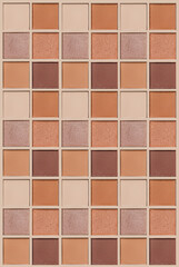 Cosmetics texture pattern, makeup palette vivid neutral color eye shadow, square eye powder swatches. Female cosmetic and beauty products, aesthetic minimal beauty photo, colorful eyeshade, top view