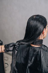 Water, shampoo and hair care for client with hairdresser, salon and scalp treatment with massage. Basin, tap and washing with hands for dye hairstyle, relax and customer person for keratin service