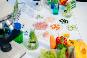 Explore a modern food science lab with fresh samples, test tubes, and microscopes. Ideal for biotechnology