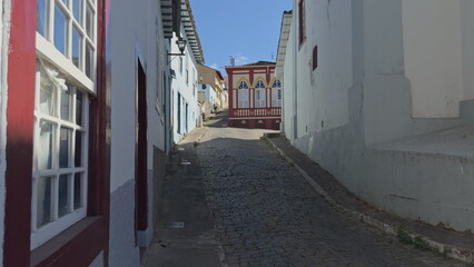 Walking through cobblestone streets in colonial Minas Gerais, Brazil