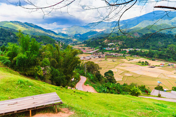 Scenic Rural Landscape Surrounded by Mountains and a Beautiful Sky at Nan, Thailand