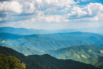Scenic nature landscape surrounded by Mountains and a Beautiful blue Sky at Nan, Thailand