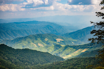 Scenic nature landscape surrounded by Mountains and a Beautiful blue Sky at Nan, Thailand