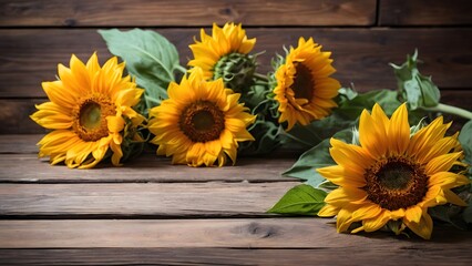 Obraz premium Several Vibrant Sunflowers Arranged on a Rustic Wooden Table With Green Leaves in a Warm Indoor Setting