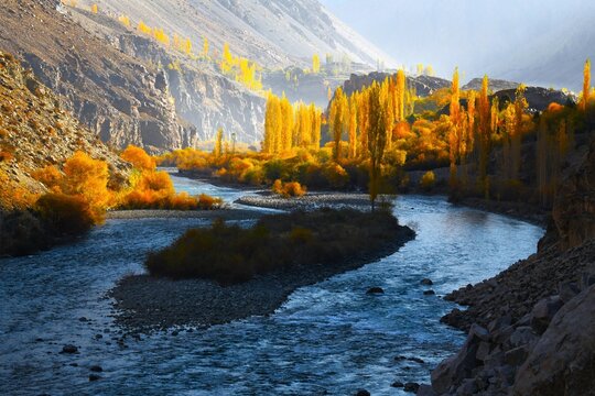 Mysterious misty morning in the Gilgit River valley near Saleemabad village (N-140 road between Phander and Gupis, Gilgit-Baltistan, Pakistan)