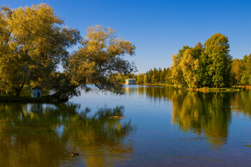 Autumn landscape. View of Lake Beloye in the Palace Park. The landscape park ensemble Palace Park was created at the end of the 18th century. Gatchina. Leningrad Region, Russia. Tourist attraction.