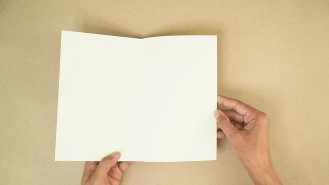 Opening handmade decorated vintage Valentine wish card with stickers