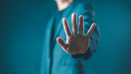 person's hand showing palm gestures stop, concept violence, warning, refuse, defense, caution. the...
