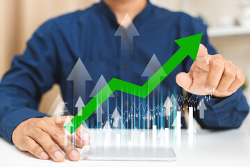 businessman pointing at Trading bar graph grow up. Stock exchange marketing analyzing chart. information statistics diagram profit. investment and marketing concept.