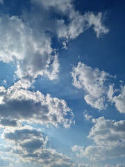 
Blue sky and white puffy clouds