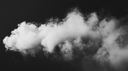 Fototapeta premium A soft dust cloud gently rising from the bottom, slowly dispersing as it fades into black