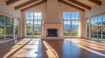 Fototapeta premium Spacious living room with large windows, a fireplace, and wooden floors. Sunlight streams in from the windows, creating a bright and airy atmosphere.