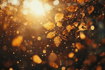 Golden leaves against a sunlit background with bokeh effect.