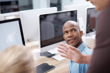 Computer, training and web development with business people in creative workplace for meeting. Coaching, direction and hand with man and woman designer ot programmer group at desk in office together