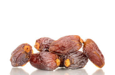 Dried sweet dates  isolated on white background, close-up.