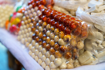 A bag of nuts is displayed on a table