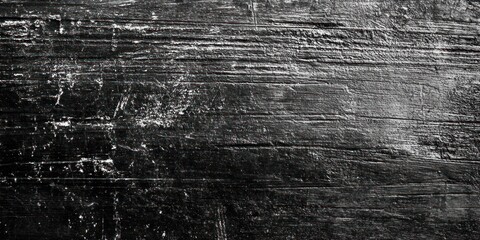 Grunge textured black wood background.