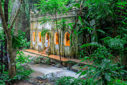 Natural background of ancient sculptures of religious tourist attractions, Naga statues, old churches by the natural waterfall from the high mountain, Wat Phalat, the way up to Doi Suthep, Chiang Mai
