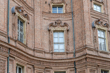 monumental window on Carignano Palace waving facade, Torino, Italy