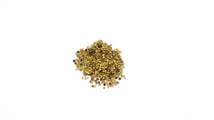 Coriander seeds on isolated white background