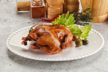 Baked small chicken with spices