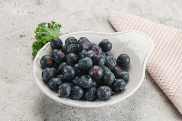Sweet ripe blueberry on the bowl