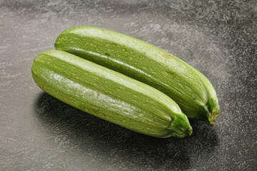 Raw green ripe zucchini vegetable