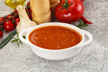 Hot tomato soup with diced chicken