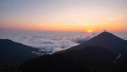  Sunset over a mountainous landscape with clouds
