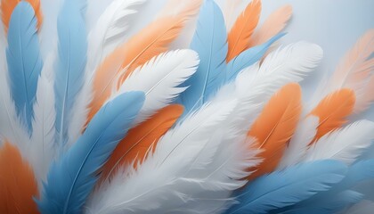 Fototapeta premium Plumas suaves y esponjosas en tonos de blanco, naranja y azul, creando un fondo abstracto cálido y texturizado