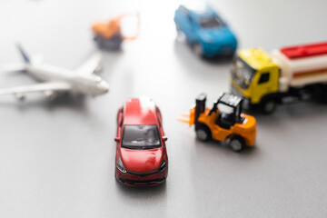 Travel concept. Toy model of car and airplane.