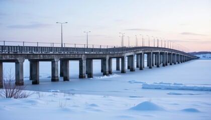 Obraz premium Wintry serenity A bridges silhouette against the snowy landscape
